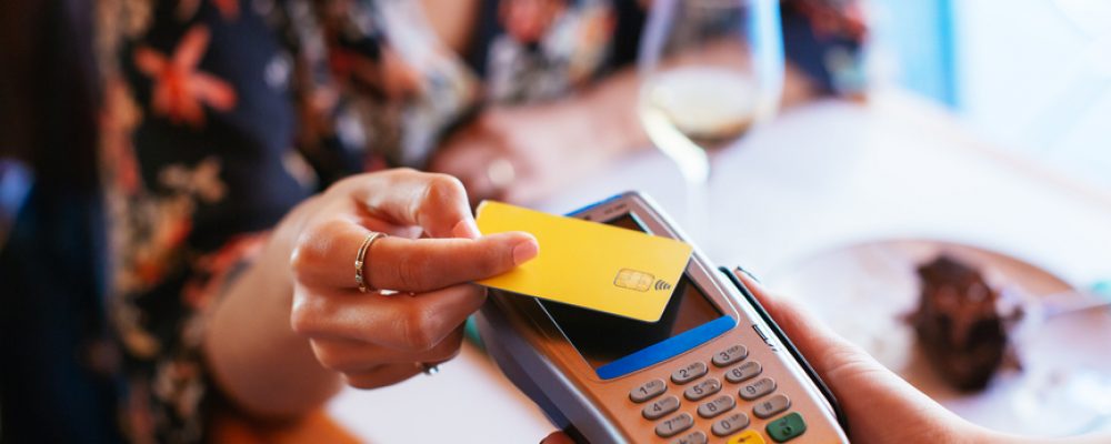 Costumer Paying With Credit Card In Restaurant. Costumer Paying With Credit Card In Restaurant.