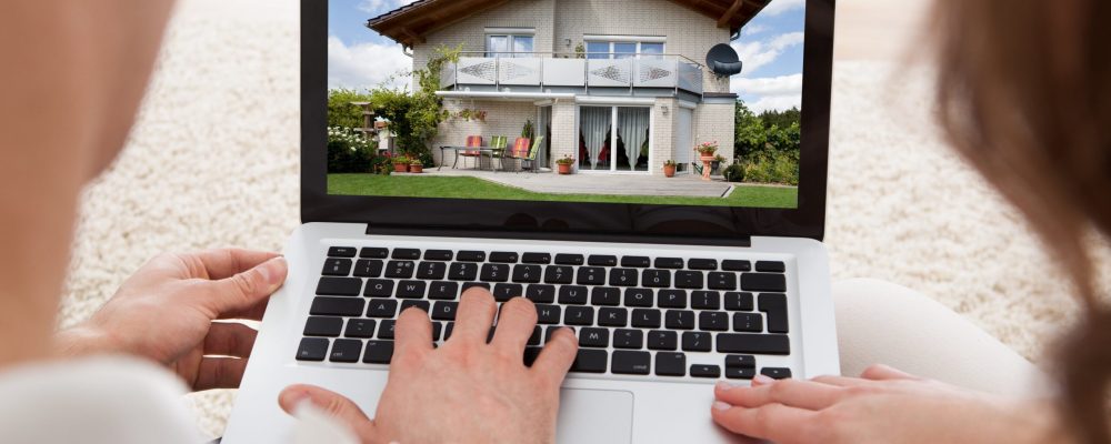 couple researching homes to buy