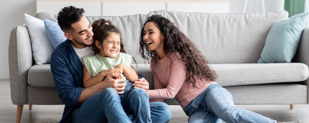 Middle,Eastern,Parents,Having,Fun,With,Their,Little,Daughter,At Middle,Eastern,Parents,Having,Fun,With,Their,Little,Daughter,At