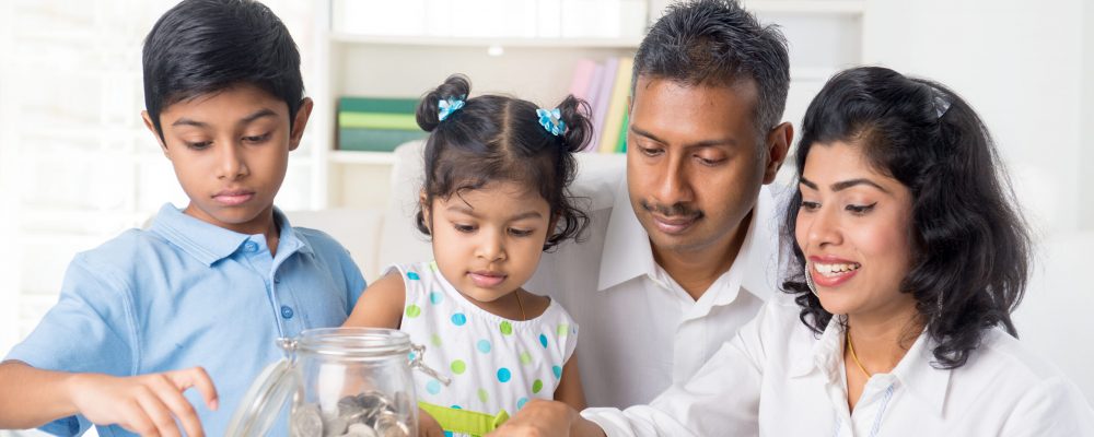 Indian,Family,Teaching,Children,On,Savings,And,Financial,Planning