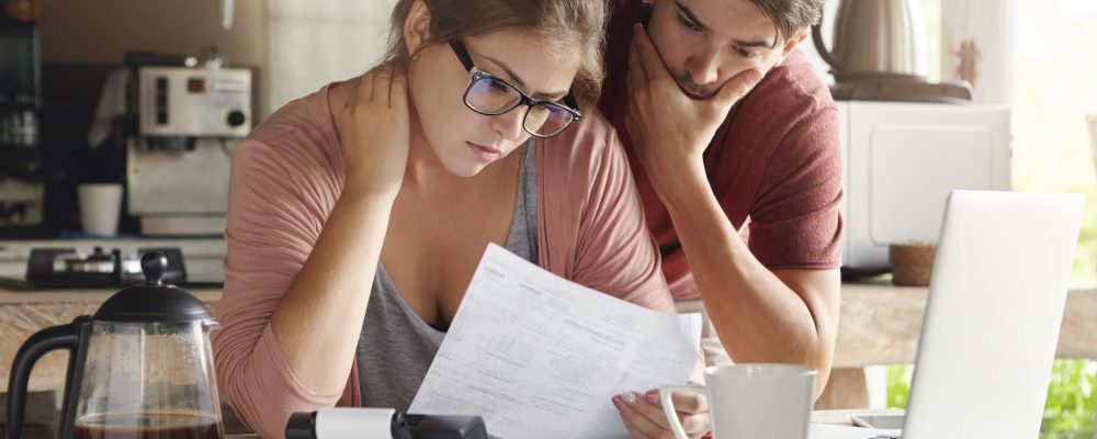 Young,Caucasian,Family,Having,Debt,Problems,,Not,Able,To,Pay