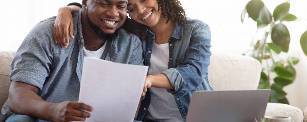 Family,Insurance,Concept.,Positive,Black,Couple,Reading,Documentation,At,Home,