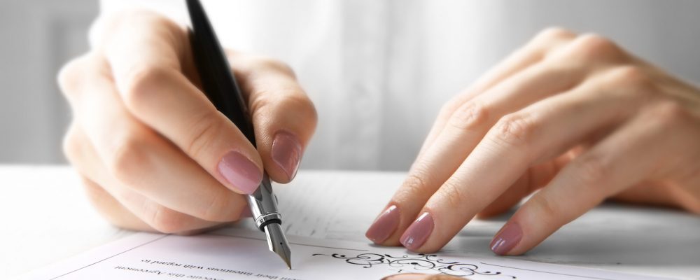 Woman,Signing,Marriage,Contract,,Closeup