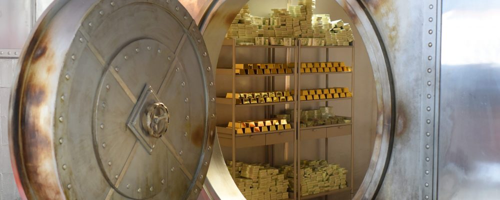 An,Open,Safe,With,Gold,And,Banknotes