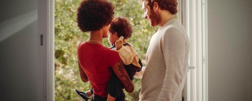 Loving,Mixed,Race,Family,Playing,With,Adorable,Baby,Boy,At